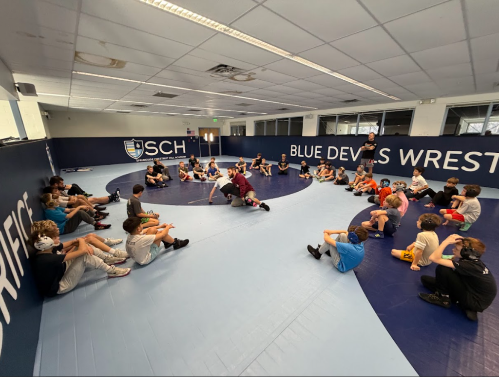 SCH Students watching a demonstration by Josh Kindig while Jeff Moretti Spectates